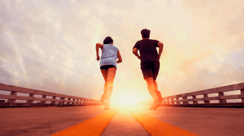 Man & Woman moving towards sunset Learn how to move towards what's important to you through Imposter syndrome therapy